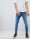 Super Skinny Jeans In Blue With Knee Rips